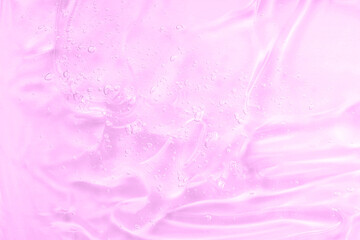 Pink gel texture. Cosmetic clear liquid smudge. Transparent skin care product sample