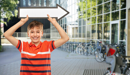 education and people concept- portrait of happy smiling boy in red polo t-shirt holding big white...