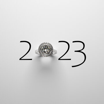 Elegant 2023 New Year design template with luxury diamond engagement ring on a white background. Creative 3D render illustration for a calendar, greeting card or banner.