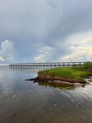 Evening skies and bridge over the Choctawhstche Bay Florida 