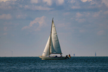 A sailboat in the Baltic Sea Device from the island of Rügen in Germany