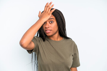 black young adult woman raising palm to forehead thinking oops, after making a stupid mistake or...