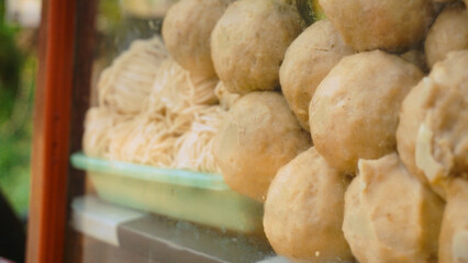 Beef meatball , Raw Indonesian Meatball with Raw Mie in the glass cupboard