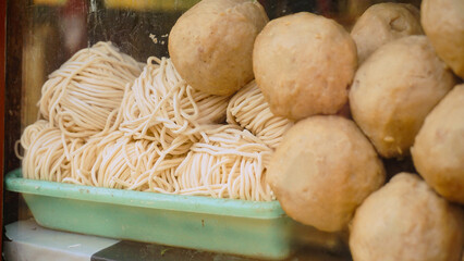 Beef meatball , Raw Indonesian Meatball with Raw Mie in the glass cupboard