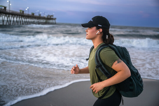 Marine veteran trains every morning on the beach to stay in shape just like when she was on active duty.