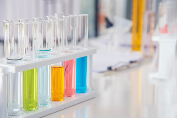 Science chemistry glass tubes objects on lab background. Liquid tube biology laboratory chemical fluid scientist object testing tubes medical glassware. Chemistry scientific pharmaceutical background