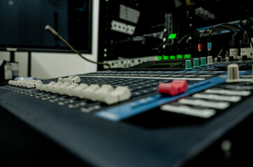 control panel and audio mixing console