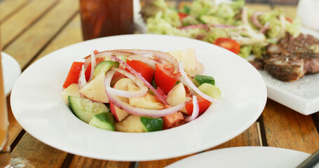 Vegetable salad with apple and cucumber