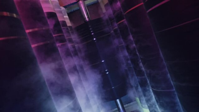 Industrial textile factory. The process of indigo dyeing .rope dyeing.
Denim dyeing process. 4K
