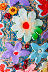 Plasticine hand made flower decoration. Abstract colorful natural background
