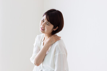 Obraz premium 肩こり 女性
