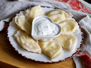 Ukrainian, Russian or Polish dish: varenyky, vareniki, pierogi, pyrohy. Dumplings, filled with...