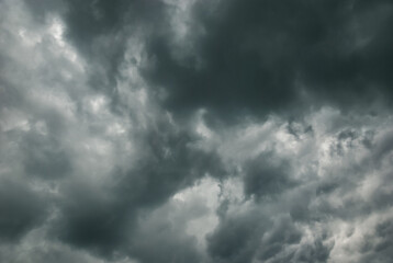 Thunderclouds in stormy sky, dark gray cloudscape before rain