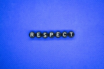 the word respect in a small black circle. the concept of respect