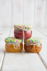 Assorted fruity Little glass jar of fresh fruit marmalade jam jelly