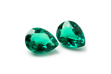 raw emeralds, gemstone jewelry on white background