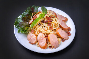 spagetti sausage.spicy isolated on black background