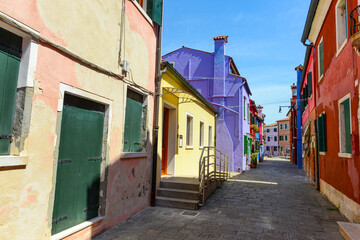 Fototapeta na wymiar Colorful houses in Burano Island. Famous travel destination, Italy