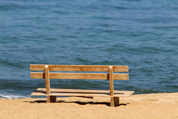 Bench for rest in the city park.
