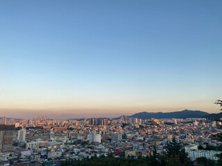 Fototapeta na wymiar City view with sunset
