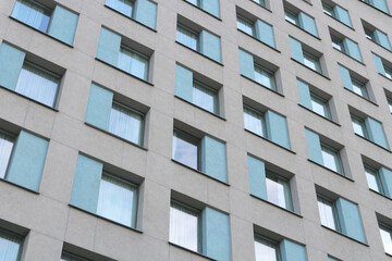Windows of an apartment building or office building. Urban background.