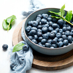 Fresh blueberry on neutral background.