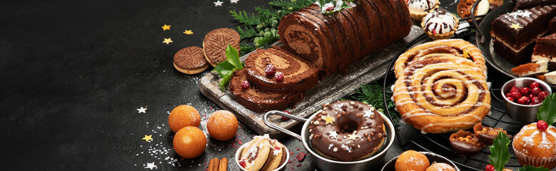 Traditional Christmas dessert on dark background.