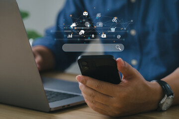 SEO Concept. Businessmen use smartphones with laptops. SEO icon for analysis SEO Search Engine...