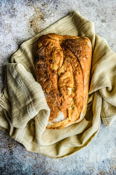 Fresh baked healthy bread on the towel