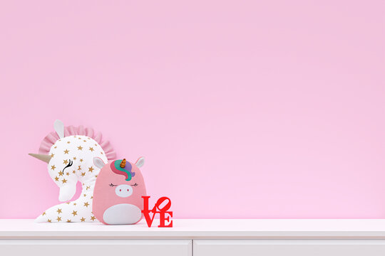 Stuffed cute unicorn pillows on a white cabinet. 3d rendered illustration.