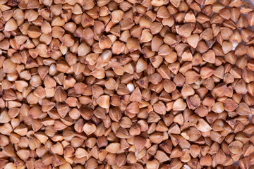 Buckwheat texture background. Natural healthy food, vegan diet. High quality photo. Buckwheat, background, macro photography.