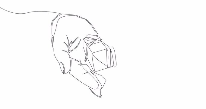 Self drawing line animation gift box with ribbon bow in hands continuous one single line drawn concept video