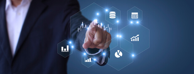 Businessman show stock market bar chart grow up to target. Business finance concept. Businessman's hands Show success graph, stocks grow every year  With copy space banner