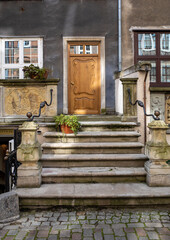 Fototapeta na wymiar Entrance to old house at Mariacka Street in Gdansk