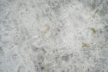 Gray marble surface as background.

