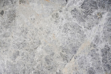 Gray marble surface as background.
