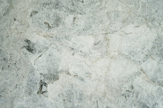 Gray marble surface as background.
