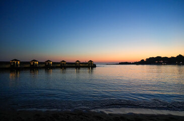 Fototapeta na wymiar Beach on the Mediterranean Sea in the Turkish Reviera. Coast at sunset near Alanya in Turkey. 