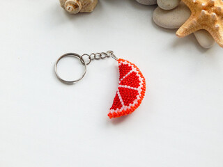 Orange key chain and stones