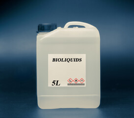 Biofuel in chemical lab in glass bottle Bioliquids