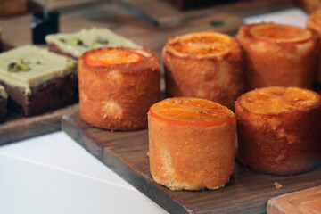 Appetizing beautiful pastries in the showcase of a London bakery