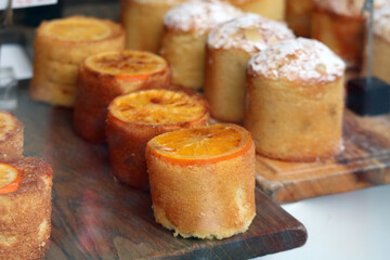 Appetizing beautiful pastries in the showcase of a London bakery