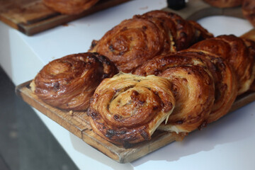 Raisin buns at a London bakery, close up 