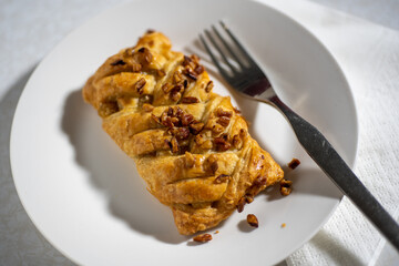Closeup of maple and pecan plait served on a plate