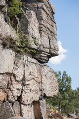 Rocks and heather in the Peak District, UK, in summer