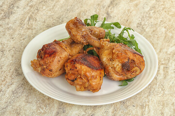 Roasted chicken leg with rucola