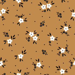 Simple vintage pattern. white and black flowers, black leaves. mustard background. Fashionable print for textiles and wallpaper.