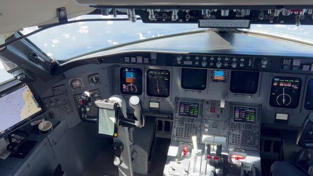 View of a jet cockpit during the cruise at 12000 metres high. 4K. Pilot point of view.