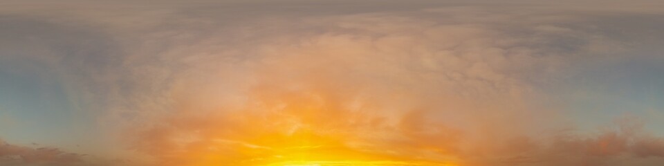 Golden glowing sunset sky panorama with Cirrus clouds. Hdr seamless spherical equirectangular 360...