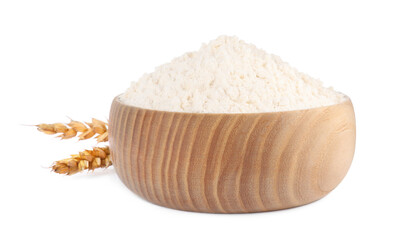 Wooden bowl with wheat flour on white background